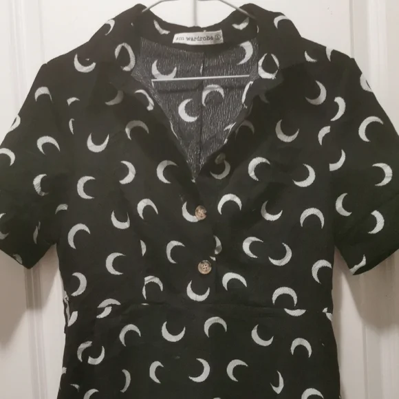 Stylish Black and White Mini Dress Cresent Moon, it has pockets. - Picture 6 of 7
